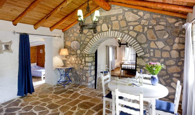 Kitchen Area And Separate Bedroom Stone House
