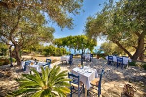 Restaurant for dinner inside the olive grove Glyfada Beach villas