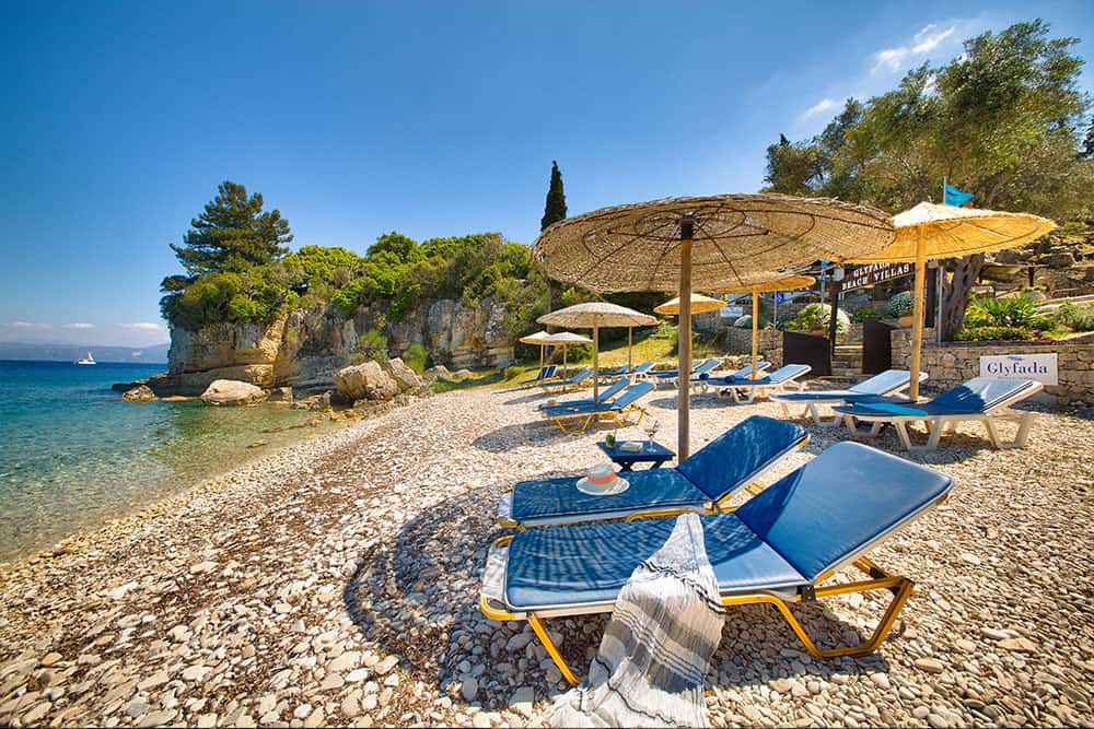 Sun beds Glyfada Beach Villas at Monodendri Beach Sun beds Glyfada Beach Villas at Monodendri Beach